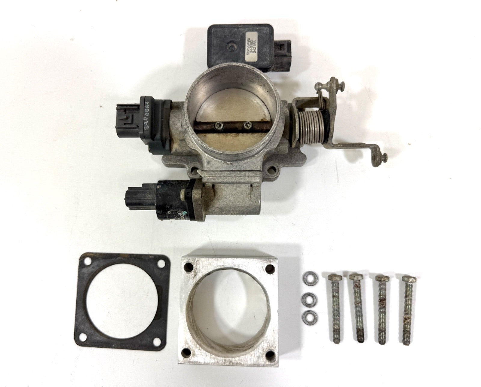 Jeep Wrangler TJ 97-01 4.0 Throttle Body Original OEM with Aftermarket Spacer0